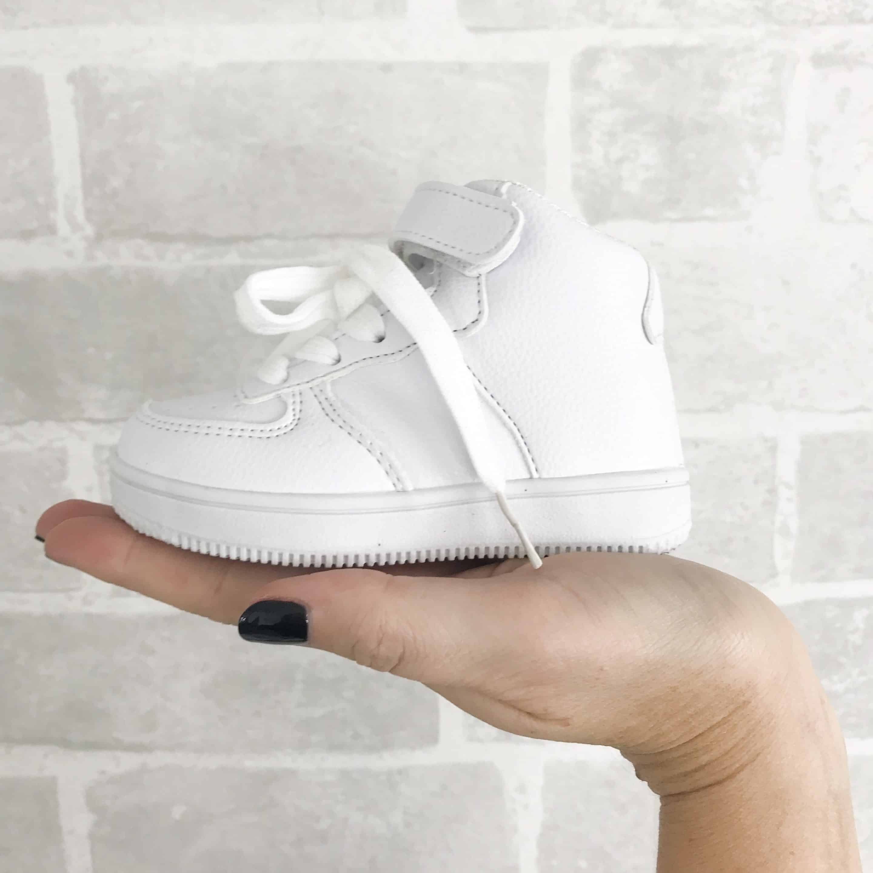 girls white high top trainers